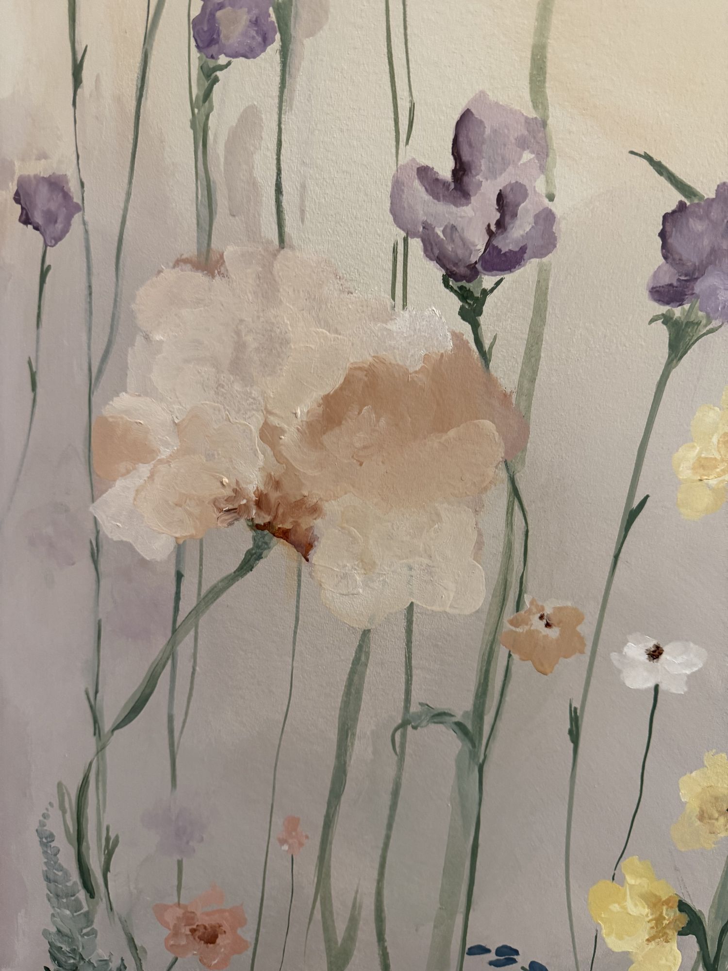 Close detail of hand-painted peach and purple iris blooms
